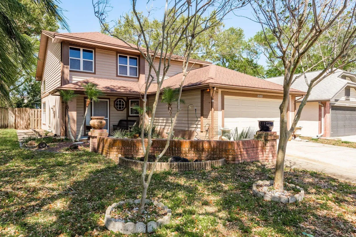 Sarasota/St. Petersburg Real Estate | View 1888 SPRINGBUSH LANE | 4 Beds, 2 Baths