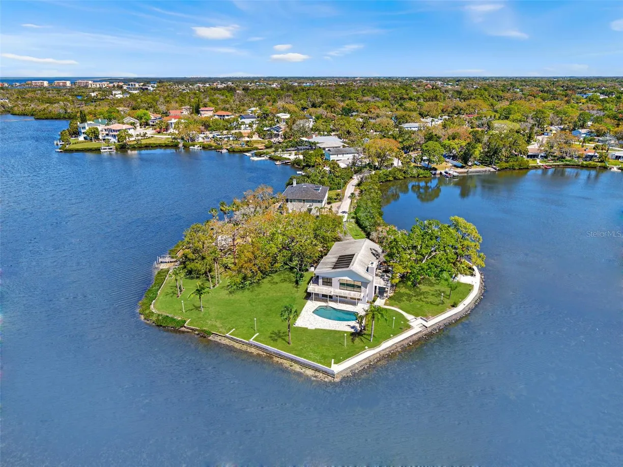 Sarasota/St. Petersburg Real Estate | View 7049 PENINSULAR DRIVE | 5 Beds, 3 Baths