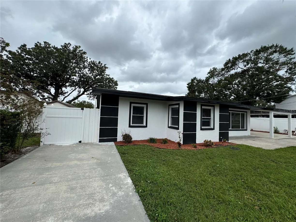 Sarasota/St. Petersburg Real Estate | View 7608 LAKESIDE BOULEVARD | Listing