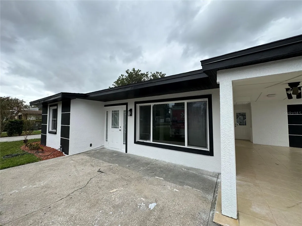 Sarasota/St. Petersburg Real Estate | View 7608 LAKESIDE BOULEVARD | Listing