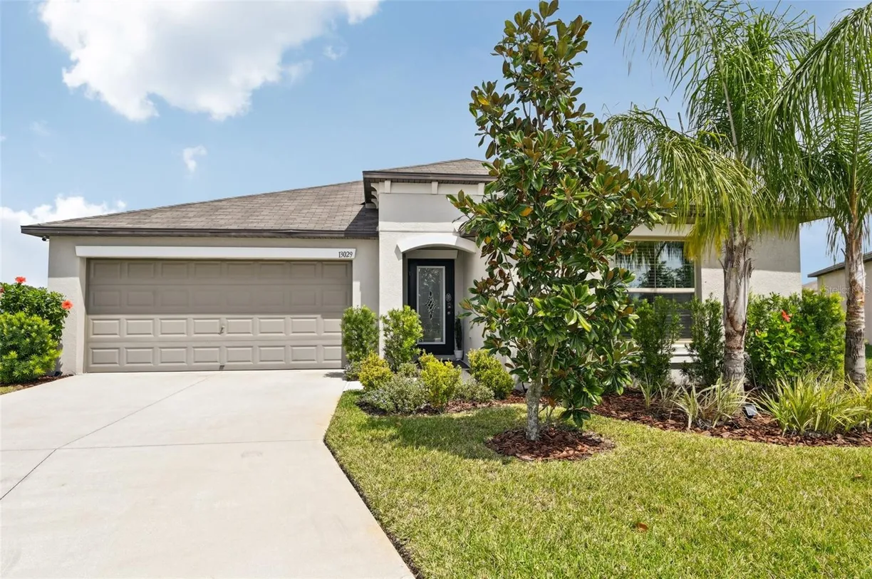 Sarasota/St. Petersburg Real Estate | View 13029 MAJESTIC GARDEN LANE | 4 Beds, 2 Baths