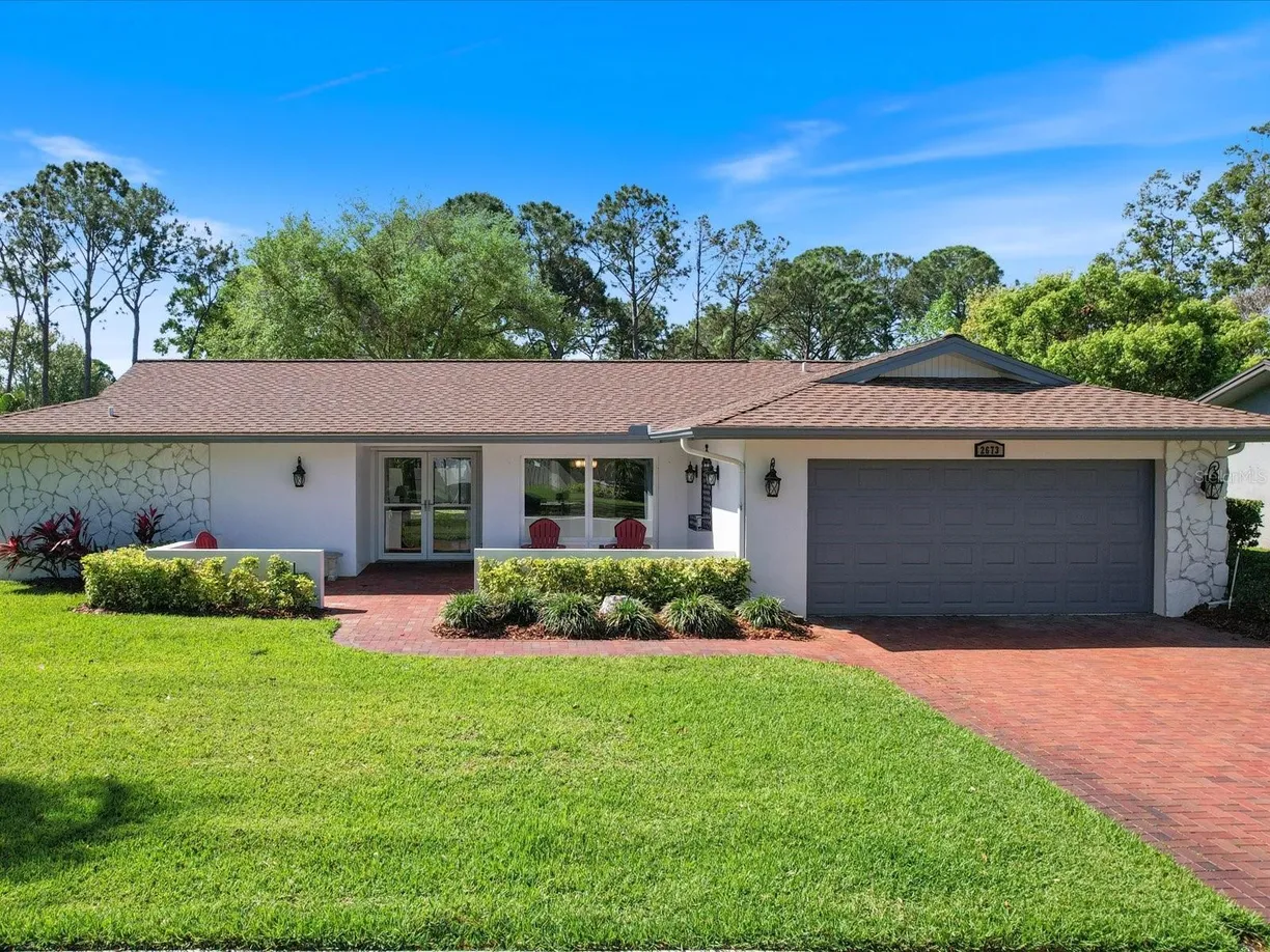 Sarasota/St. Petersburg Real Estate | View 2673 CLUBHOUSE DRIVE | 3 Beds, 3 Baths