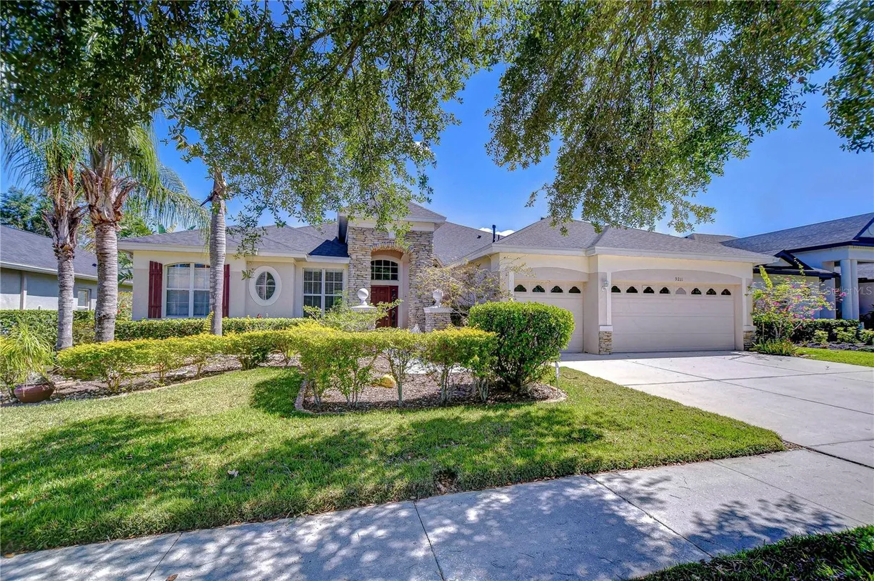 Sarasota/St. Petersburg Real Estate | View 9211 EVERWOOD COURT | 4 Beds, 3 Baths