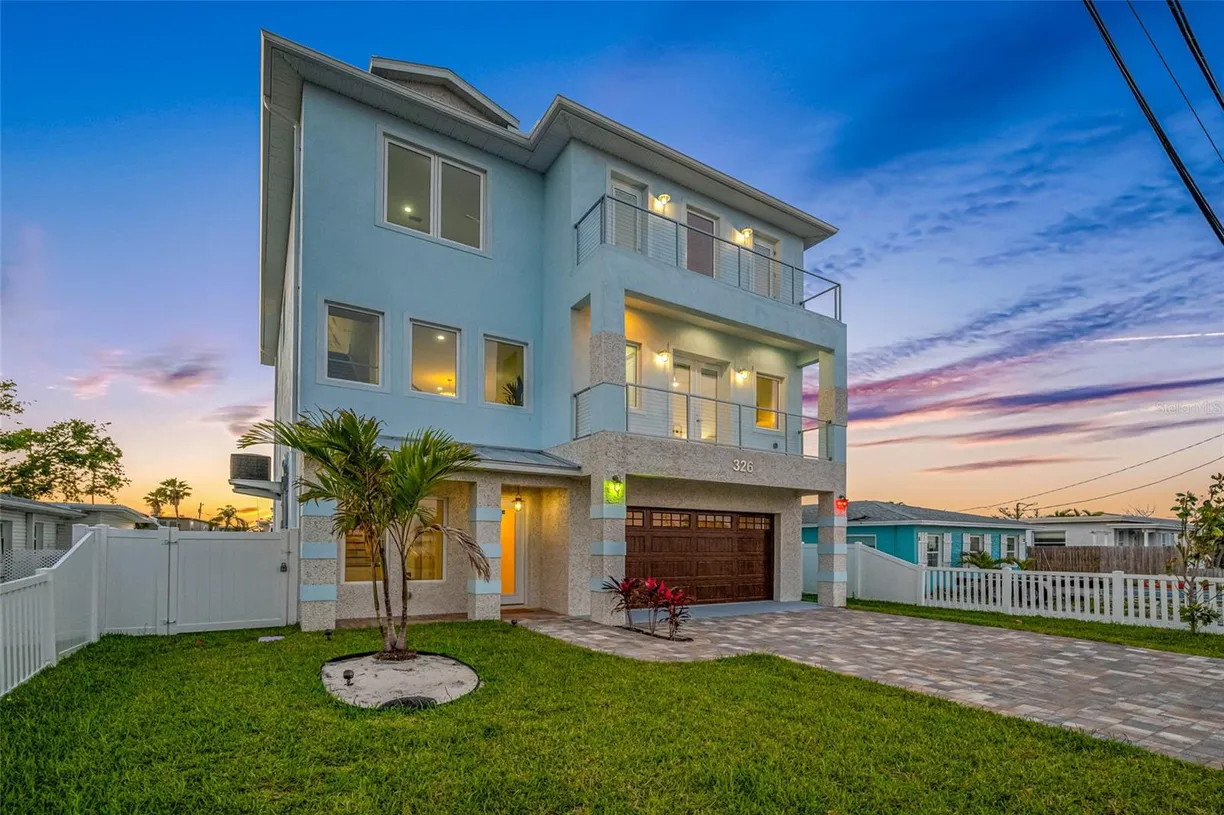 Sarasota/St. Petersburg Real Estate | View 326 129TH AVENUE | 5 Beds, 4 Baths