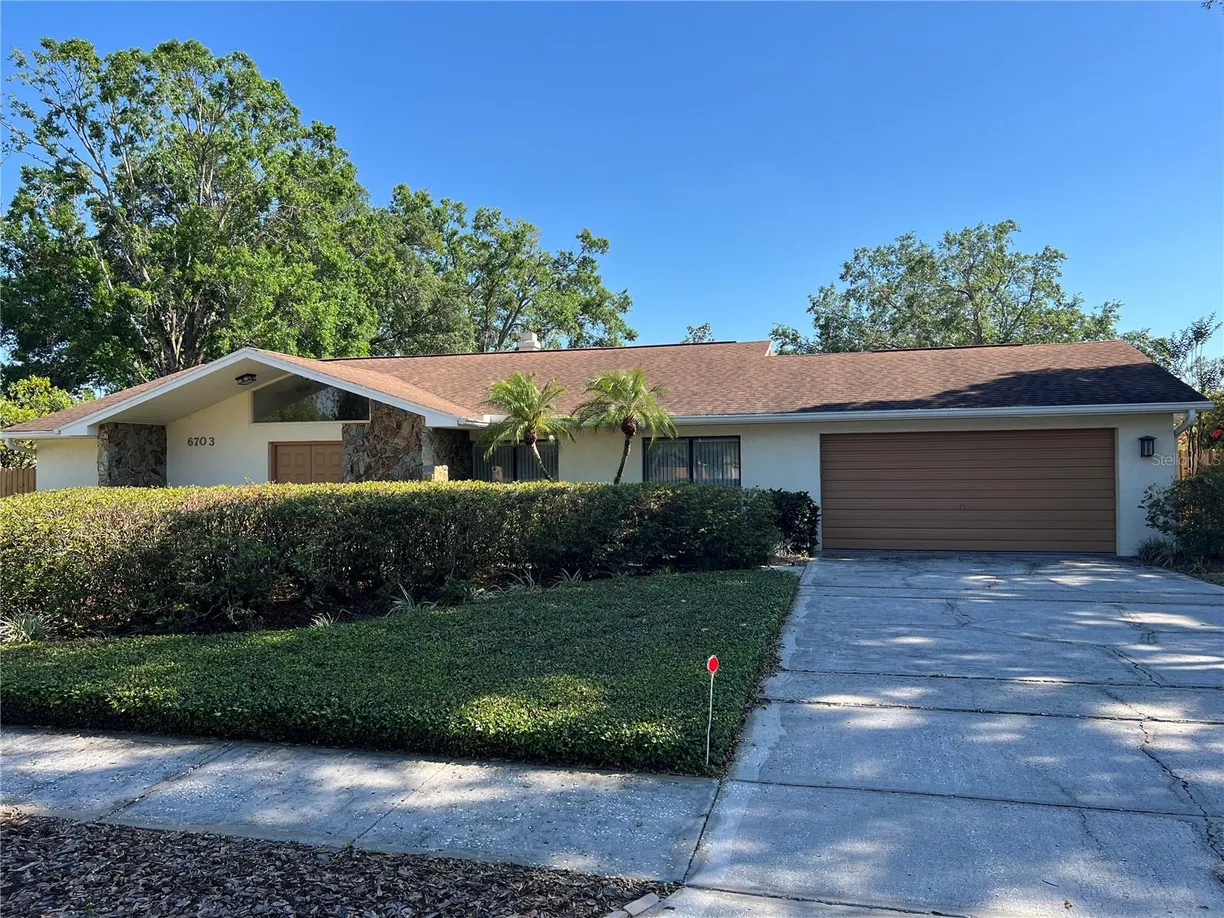 Sarasota/St. Petersburg Real Estate | View 6703 PEACHTREE DRIVE | 4 Beds, 2 Baths