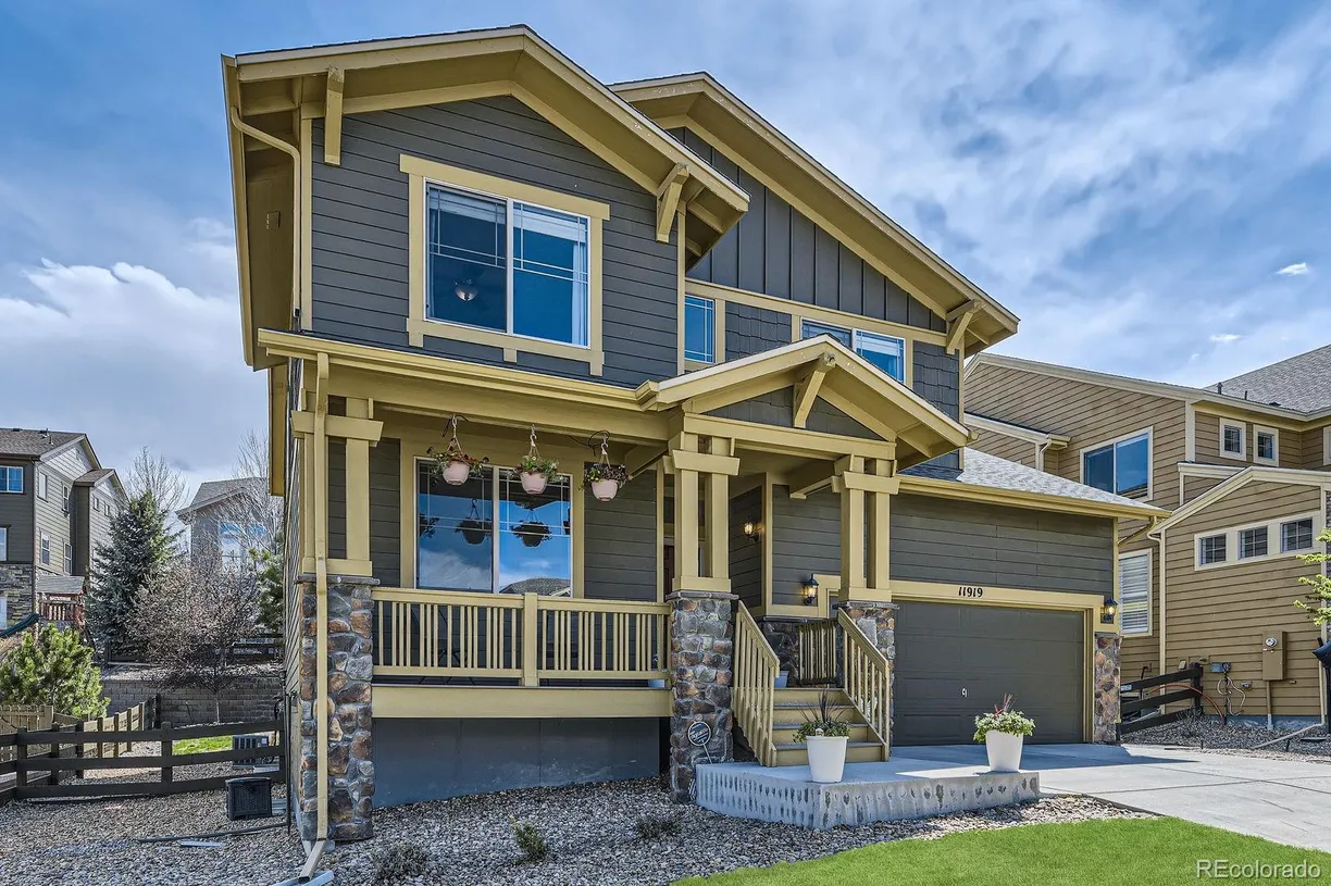 Denver Real Estate | View 11919 S Meander Way | 4 Beds, 5 Baths