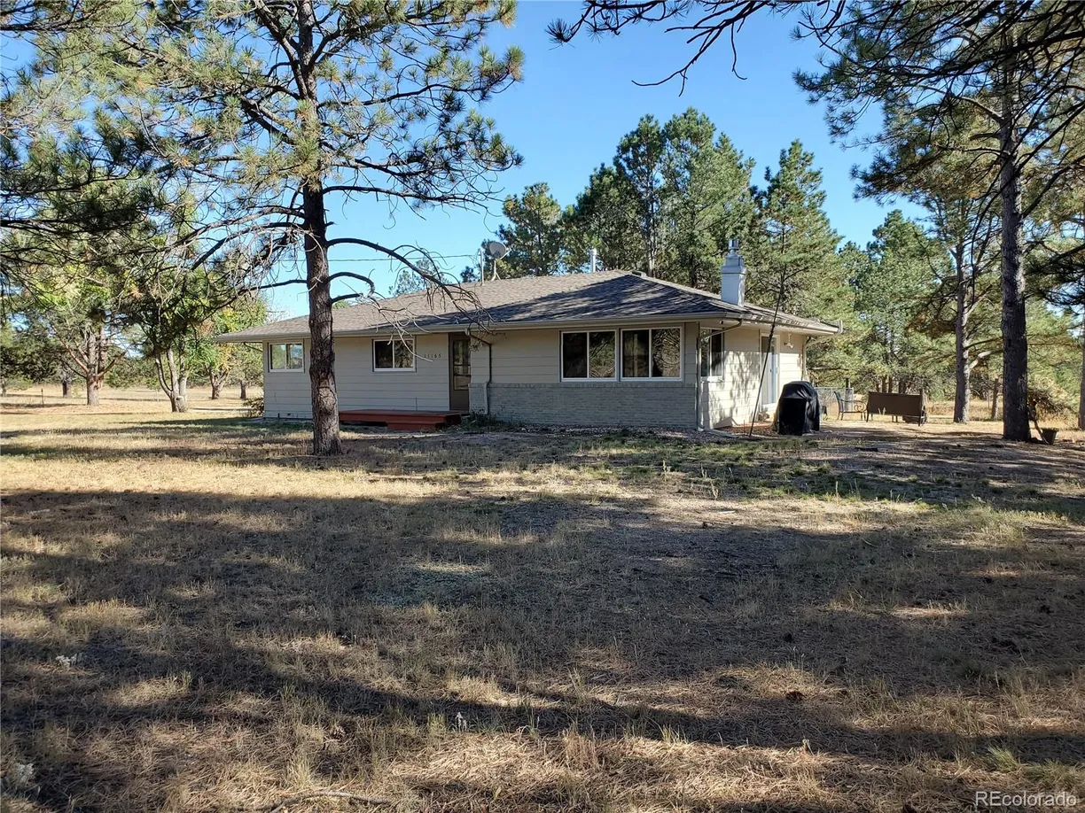 Denver Real Estate | View 11165 Pine Meadows Road | 4 Beds, 3 Baths
