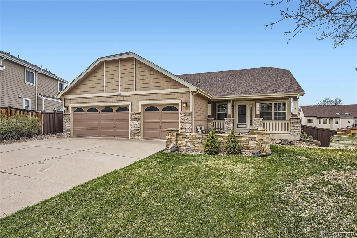 Denver Real Estate | View 6079 W Prentice Avenue | 4 Beds, 3 Baths