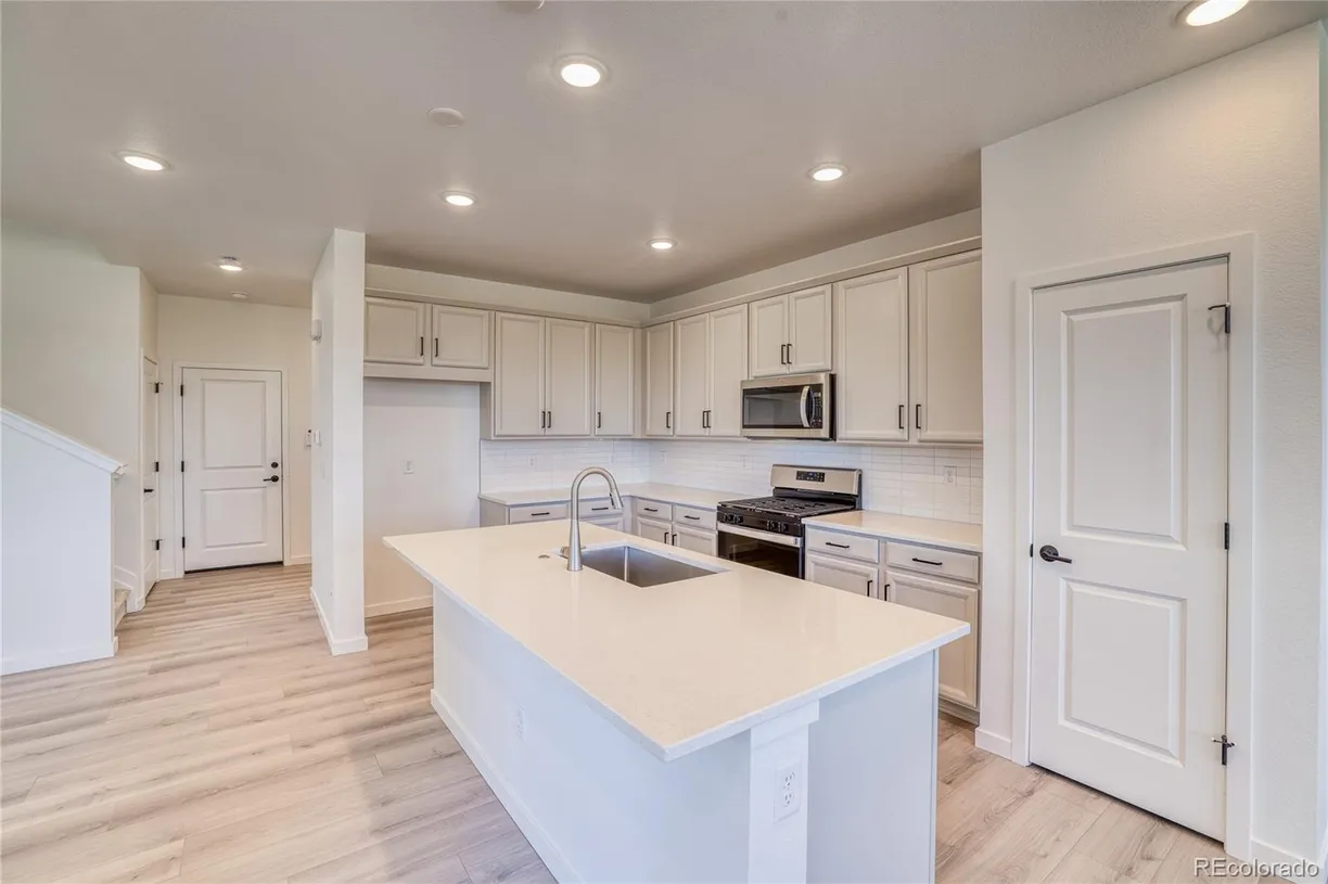 Denver Real Estate | View 8635 Hotchkiss Street | Listing