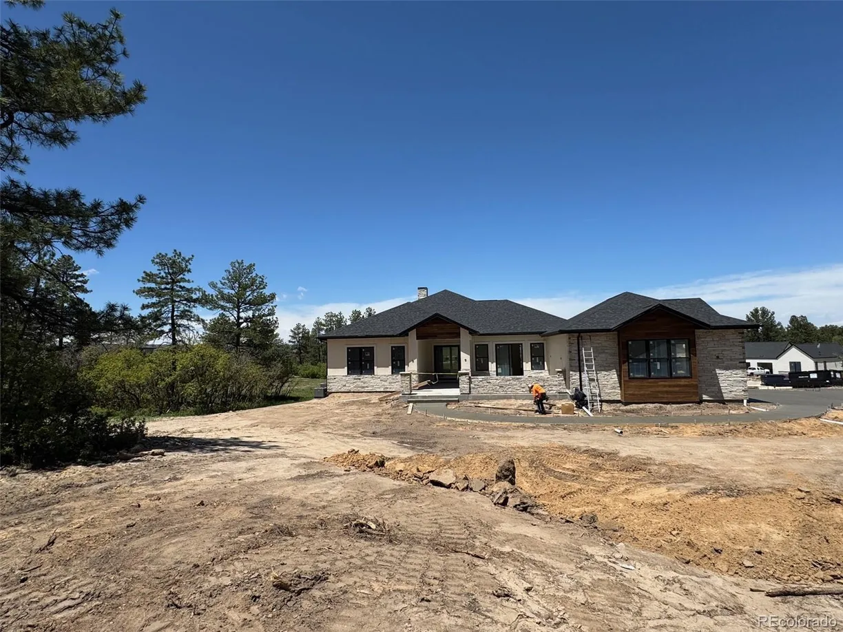 Denver Real Estate | View 1555 Arrowpoint Court | 5 Beds, 4 Baths