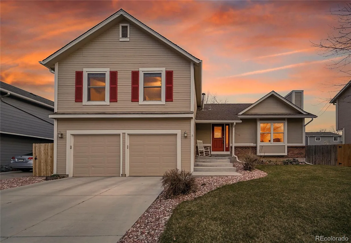 Denver Real Estate | View 12028 W Aqueduct Drive | 4 Beds, 3 Baths