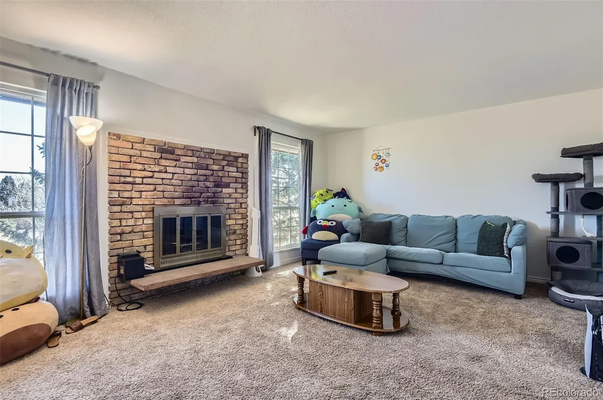 Denver Real Estate | View 3855 S Monaco Street, 209 | Listing