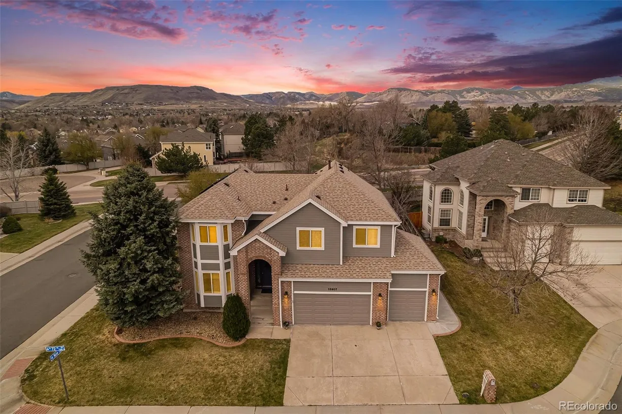 Denver Real Estate | View 15907 W 72nd Drive | 5 Beds, 3 Baths