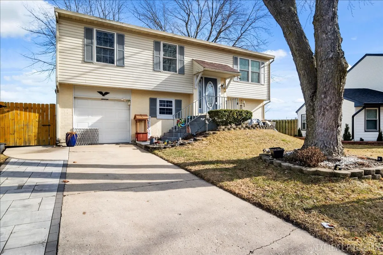 Chicago Real Estate | View 1495 Walden Circle | 4 Beds, 2 Baths