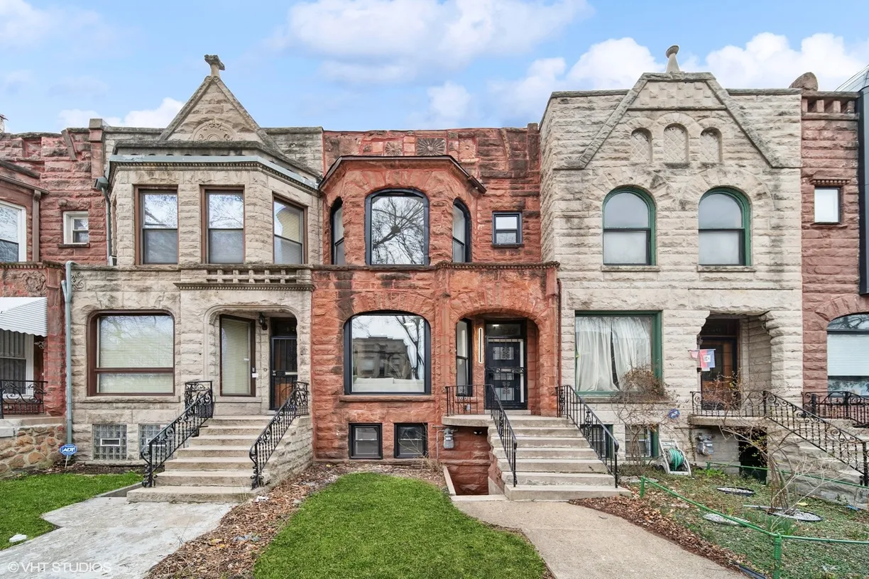 Chicago Real Estate | View 4752 S Champlain Avenue | 4 Beds, 3 Baths