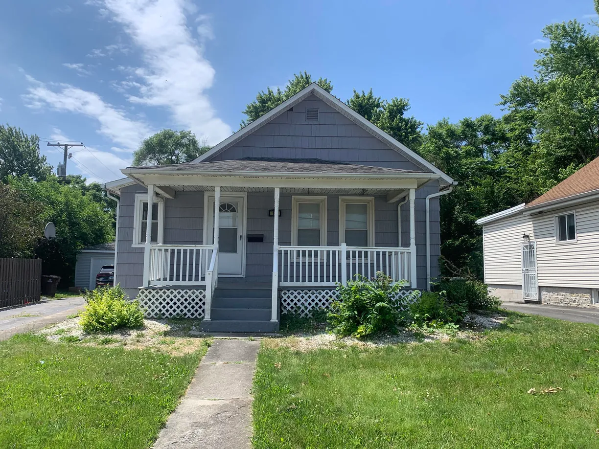 Chicago Real Estate | View 14 W Main Street | 4 Beds, 2 Baths