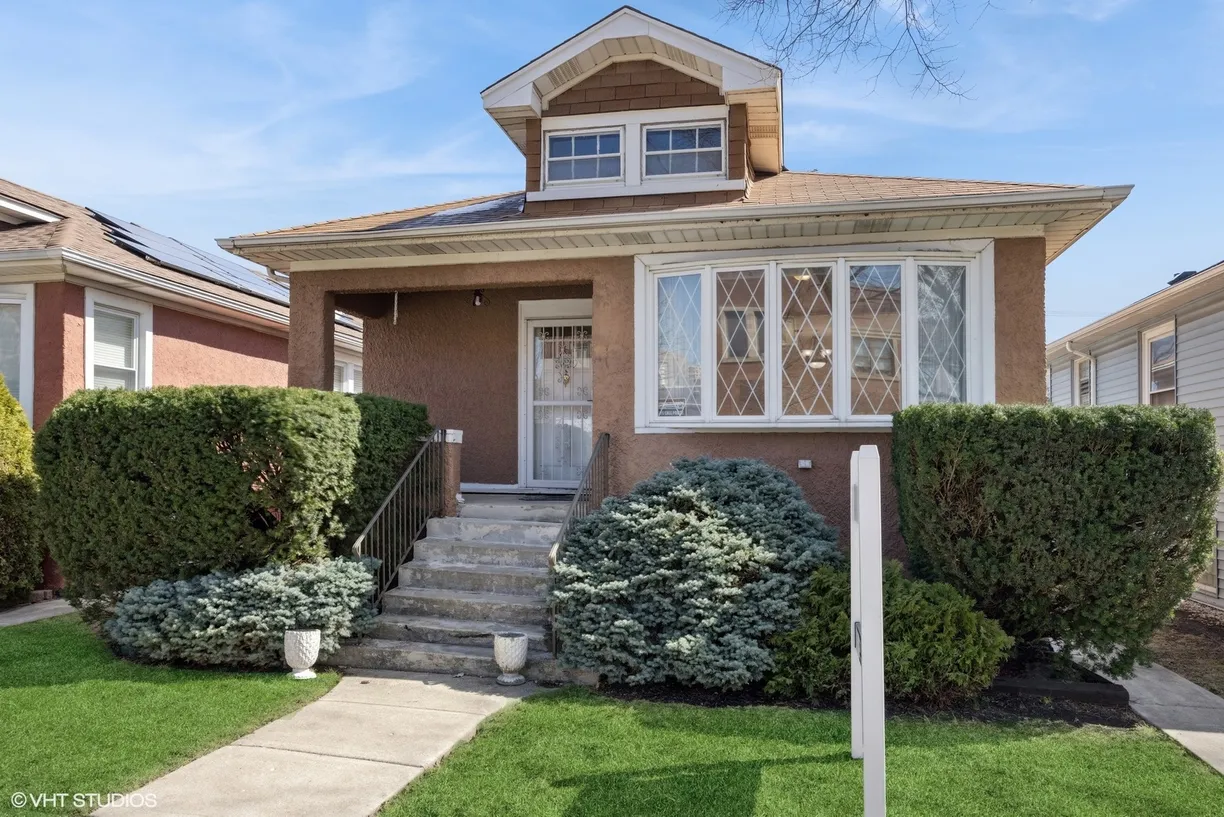 Chicago Real Estate | View 2829 N Oak Park Avenue | 2 Beds, 2 Baths
