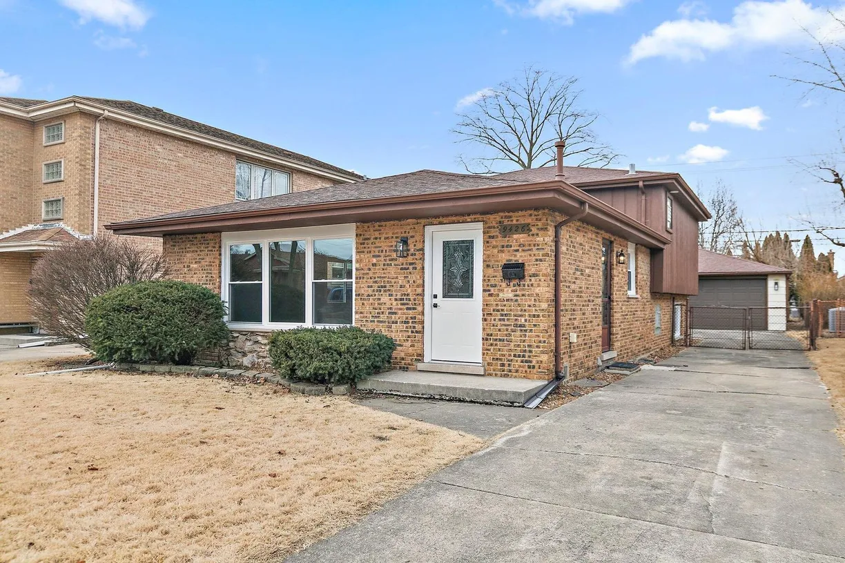 Chicago Real Estate | View 9426 S Springfield Avenue | 4 Beds, 2 Baths