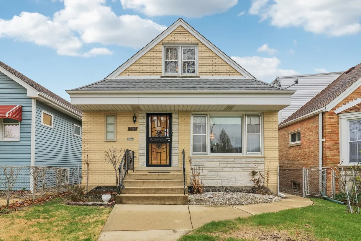 Chicago Real Estate | View 3319 N Ozanam Avenue | 5 Beds, 2 Baths