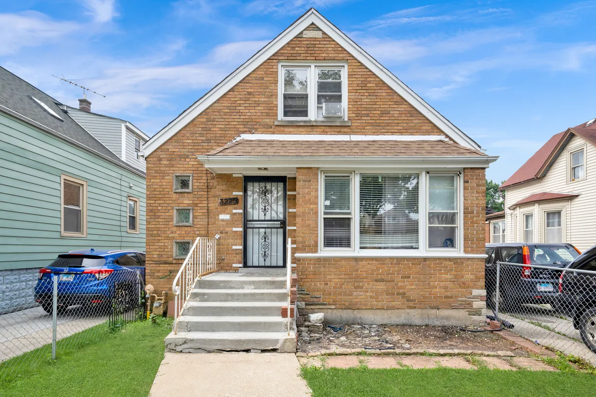 Chicago Real Estate | View 3229 W 65TH Place | 6 Beds, 3 Baths