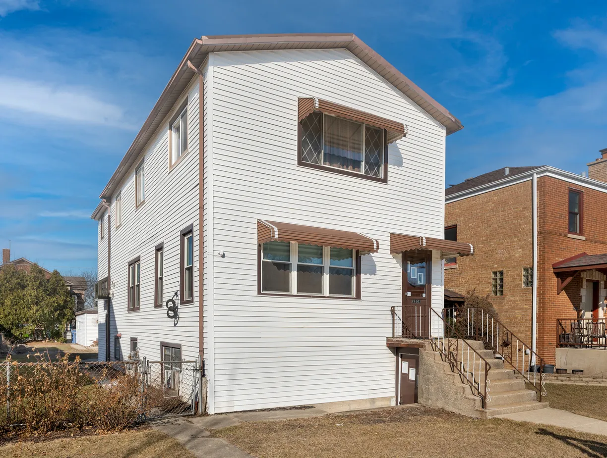 Chicago Real Estate | View 3508 N New England Avenue | 5 Beds, 3 Baths