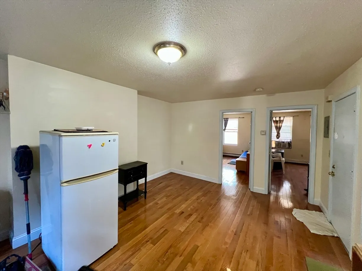 Boston, MA Real Estate | View 2 Johnny Court, 3 | 2 Beds, 1 Bath