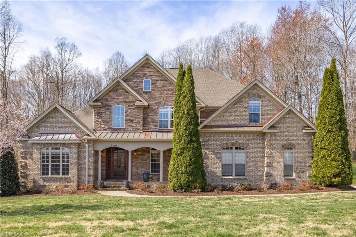 Charlotte Real Estate | View 5203 Harley Stafford Drive | 4 Beds, 3 Baths