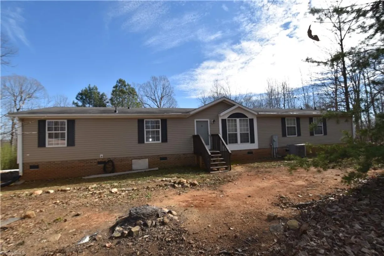 Charlotte Real Estate | View 5566 Foothills Court | 3 Beds, 3 Baths