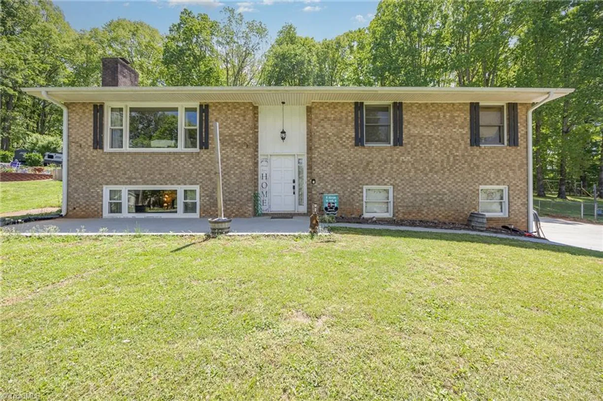 Charlotte Real Estate | View 2914 Rhonswood Drive | 5 Beds, 2 Baths