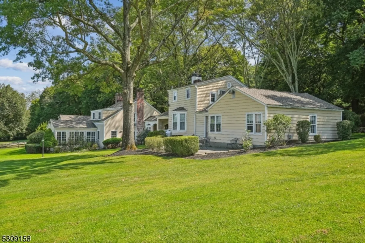 Jersey City/Hoboken Real Estate | View 75 Roxiticus Rd | 5 Beds, 5 Baths