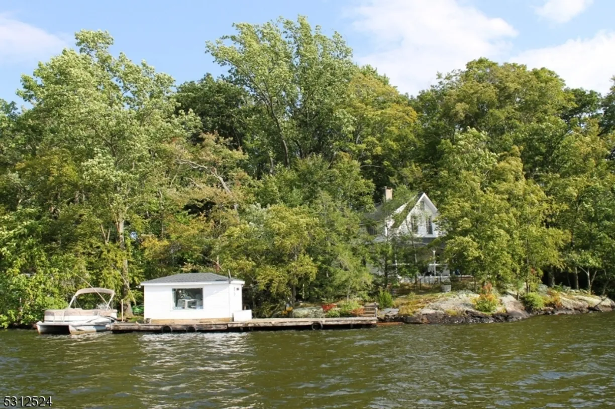Bergen County Real Estate | View 56 Raccoon Island Rd | 4 Beds, 2 Baths