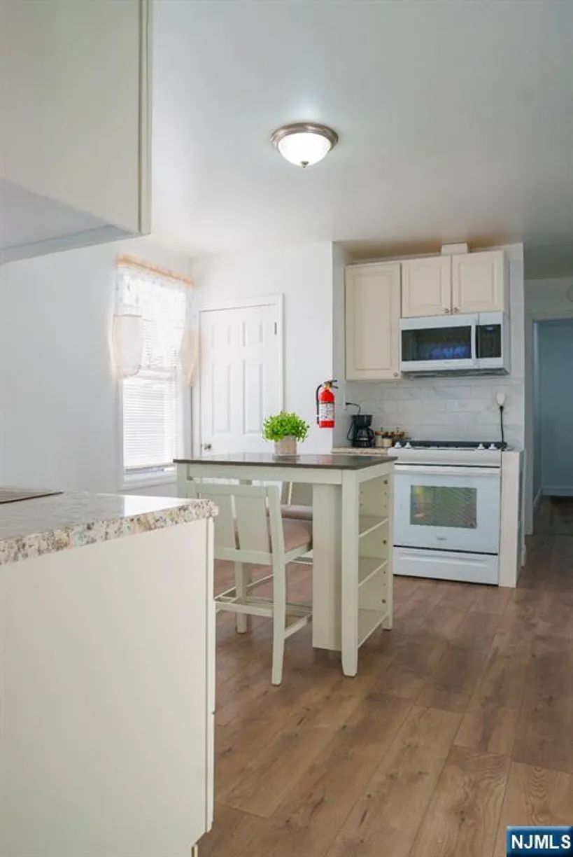 Jersey City/Hoboken Real Estate | View 393 Highland | Listing