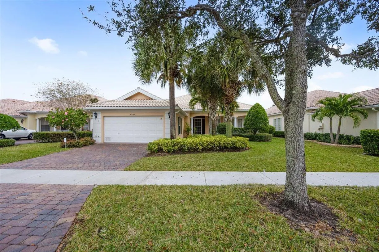 South Florida Real Estate | View 8435 Yorke Road | 4 Beds, 4 Baths