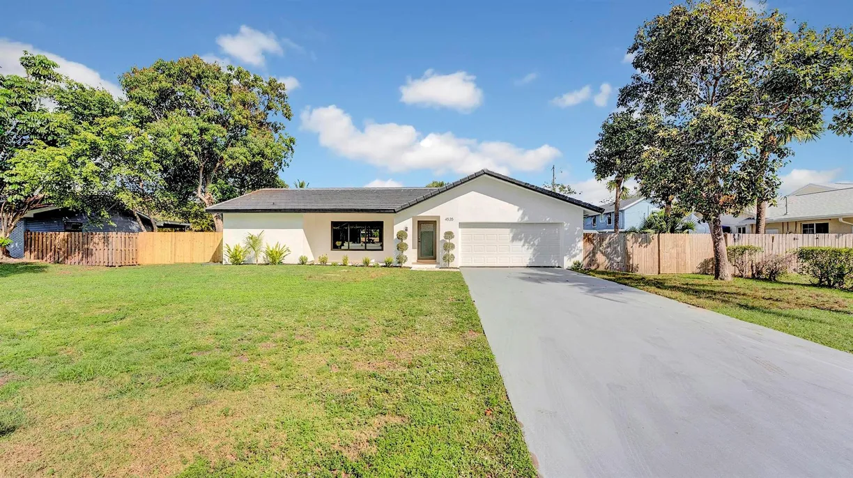 South Florida Real Estate | View 4535 Palm Ridge Boulevard | 3 Beds, 2 Baths
