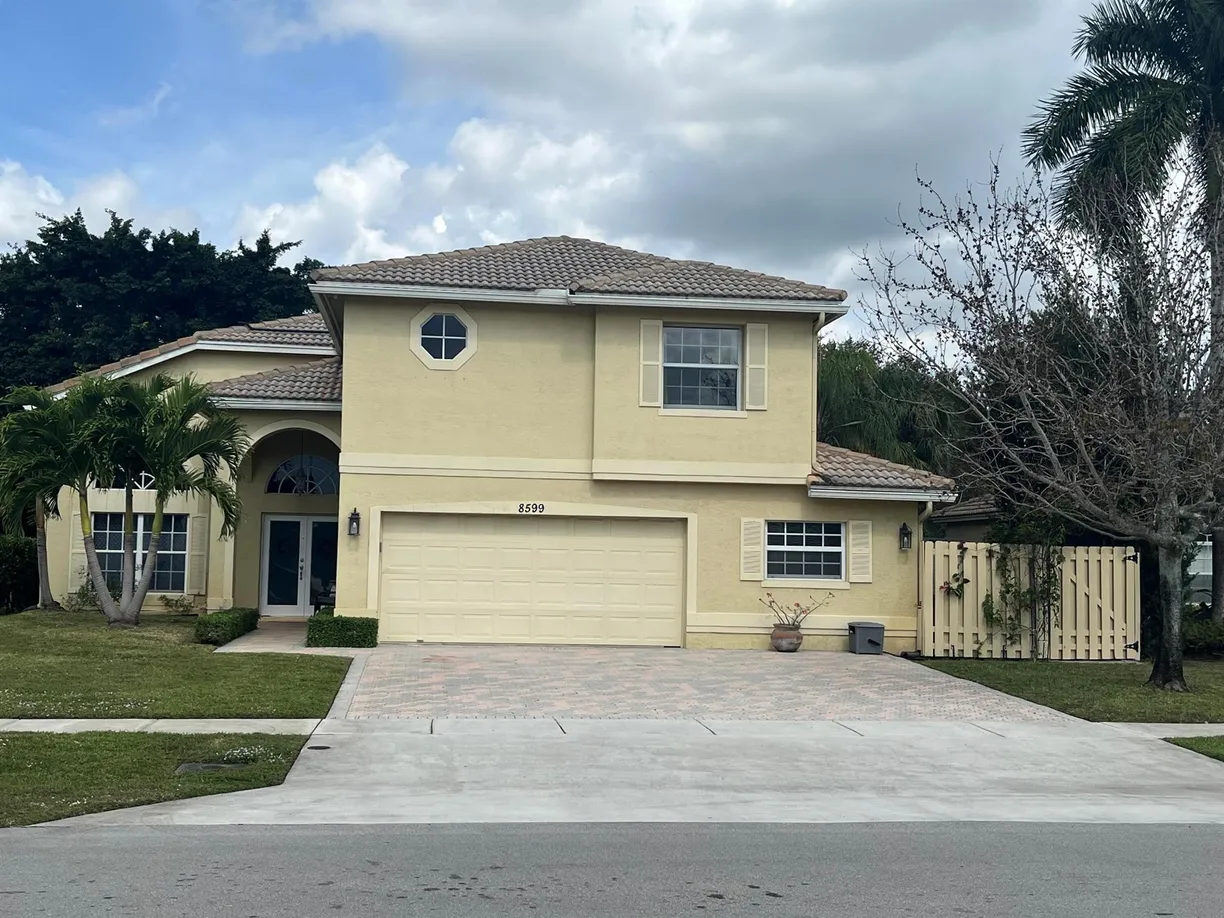 South Florida Real Estate | View 8599 W Cypress Springs Road | 4 Beds, 3 Baths