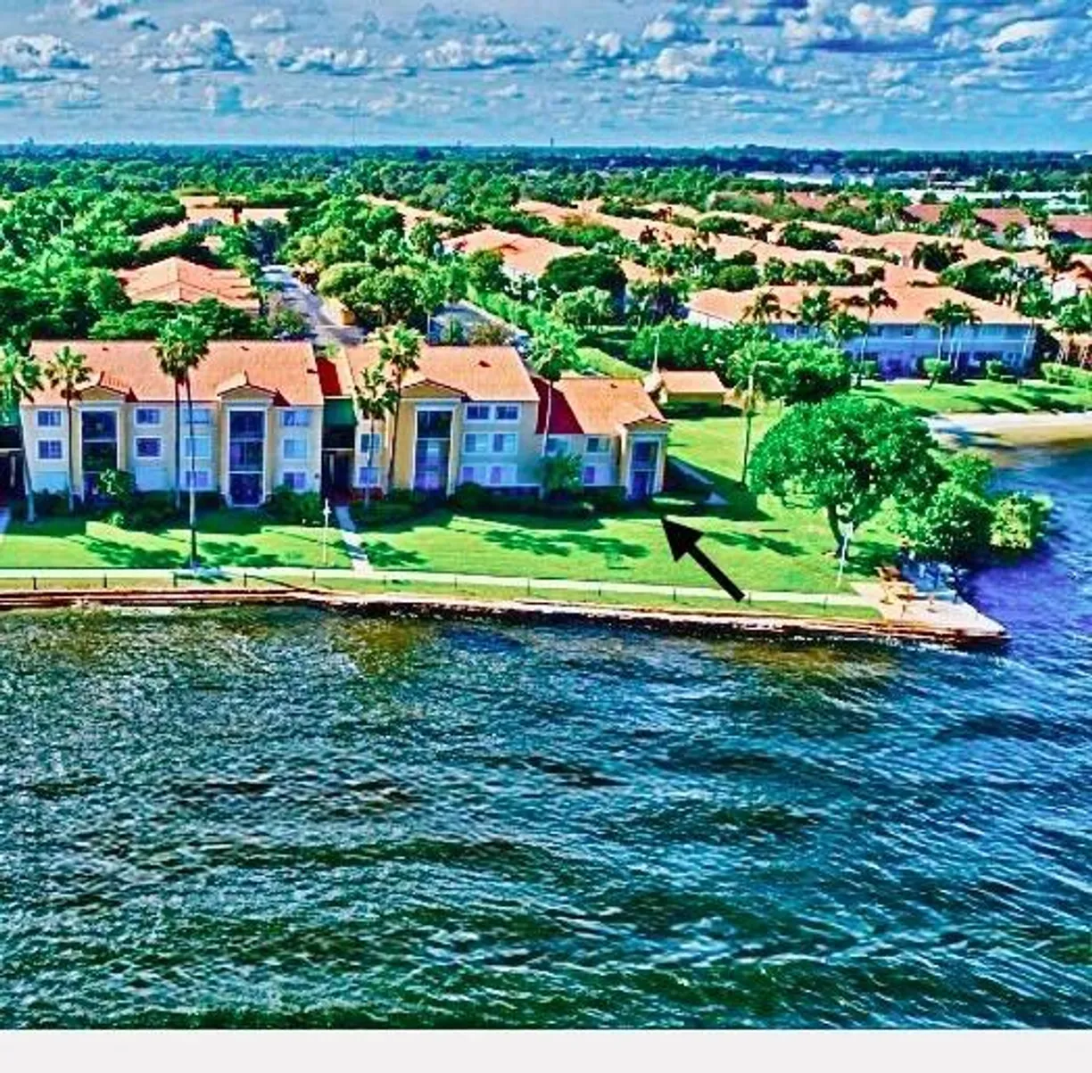 South Florida Real Estate | View 180 Yacht Club Way, 102 | 2 Beds, 1 Bath
