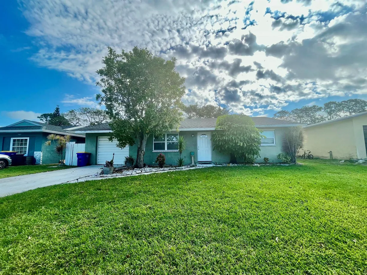 South Florida Real Estate | View 5619 SE Normandy Avenue | 3 Beds, 2 Baths