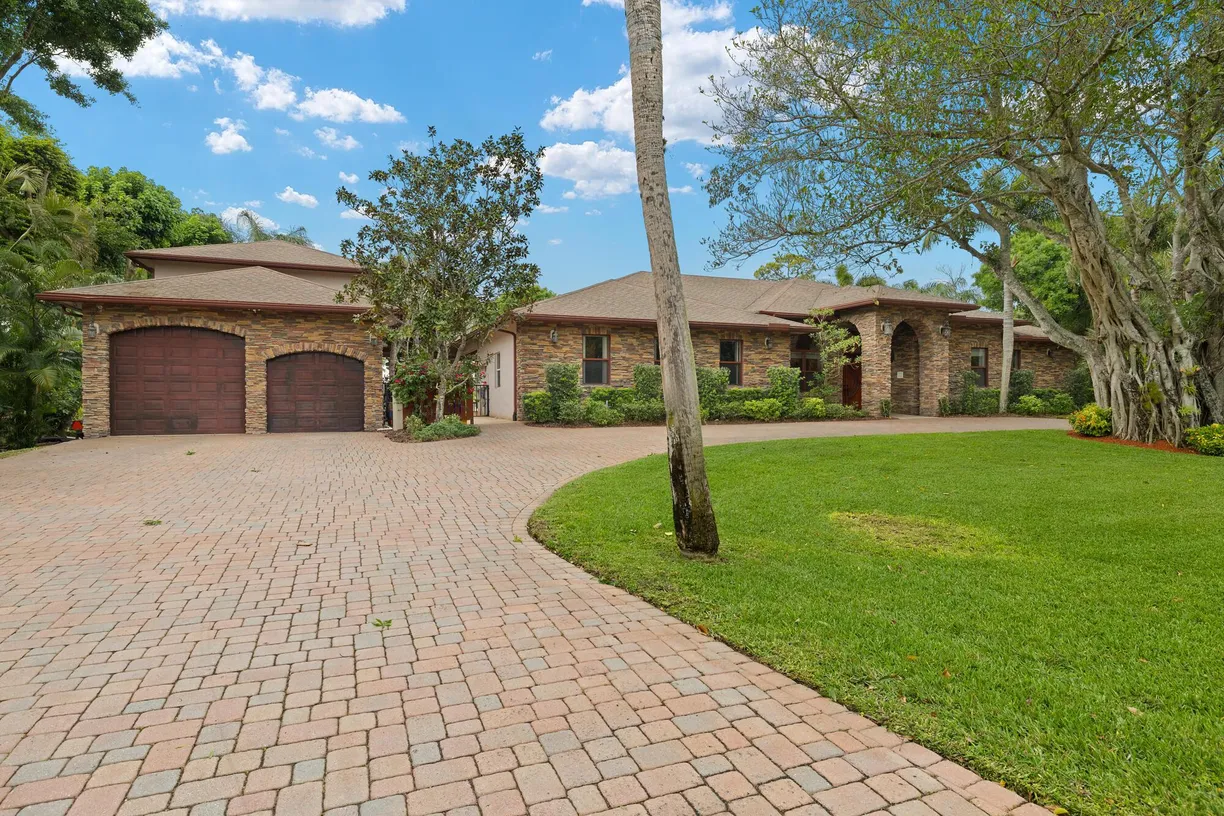 South Florida Real Estate | View 265 Westwood Circle | 4 Beds, 3 Baths