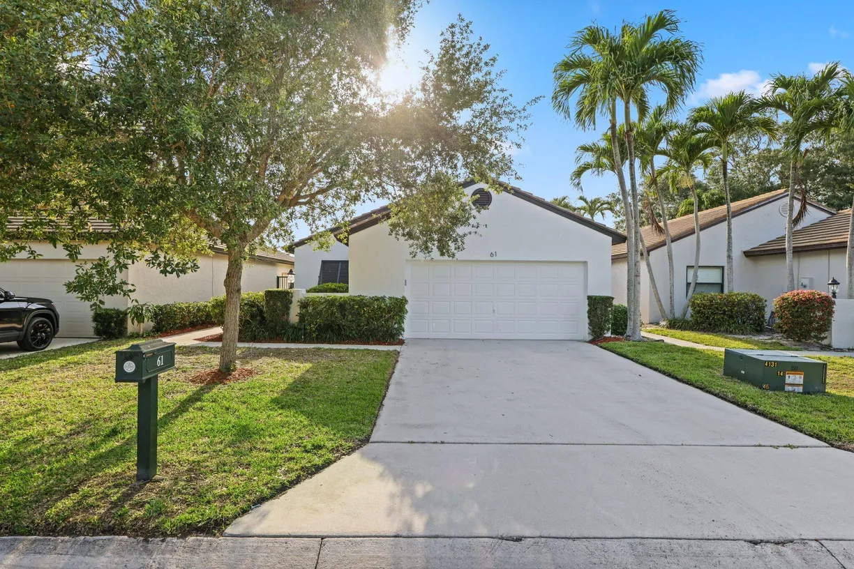 South Florida Real Estate | View 61 N Ironwood Way | 3 Beds, 2 Baths
