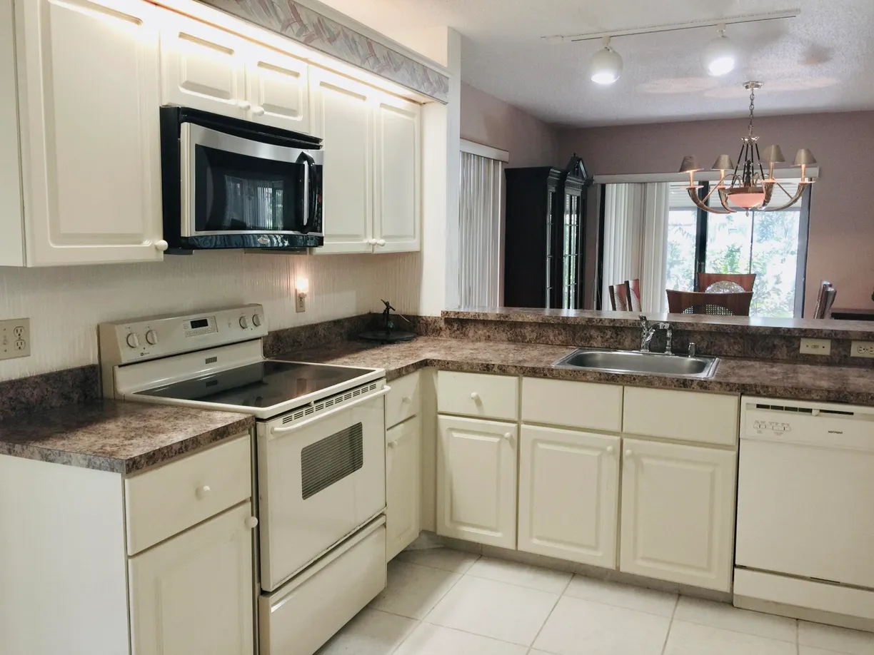 South Florida Real Estate | View 10694 Ocean Palm Way, 101 | 3 Beds, 2 Baths