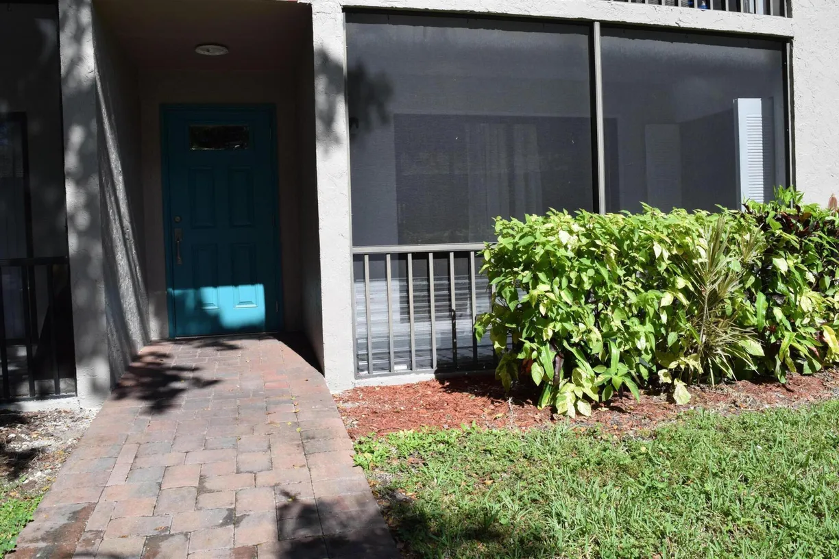 South Florida Real Estate | View 9780 Pineapple Tree Drive, 107 | 2 Beds, 2 Baths