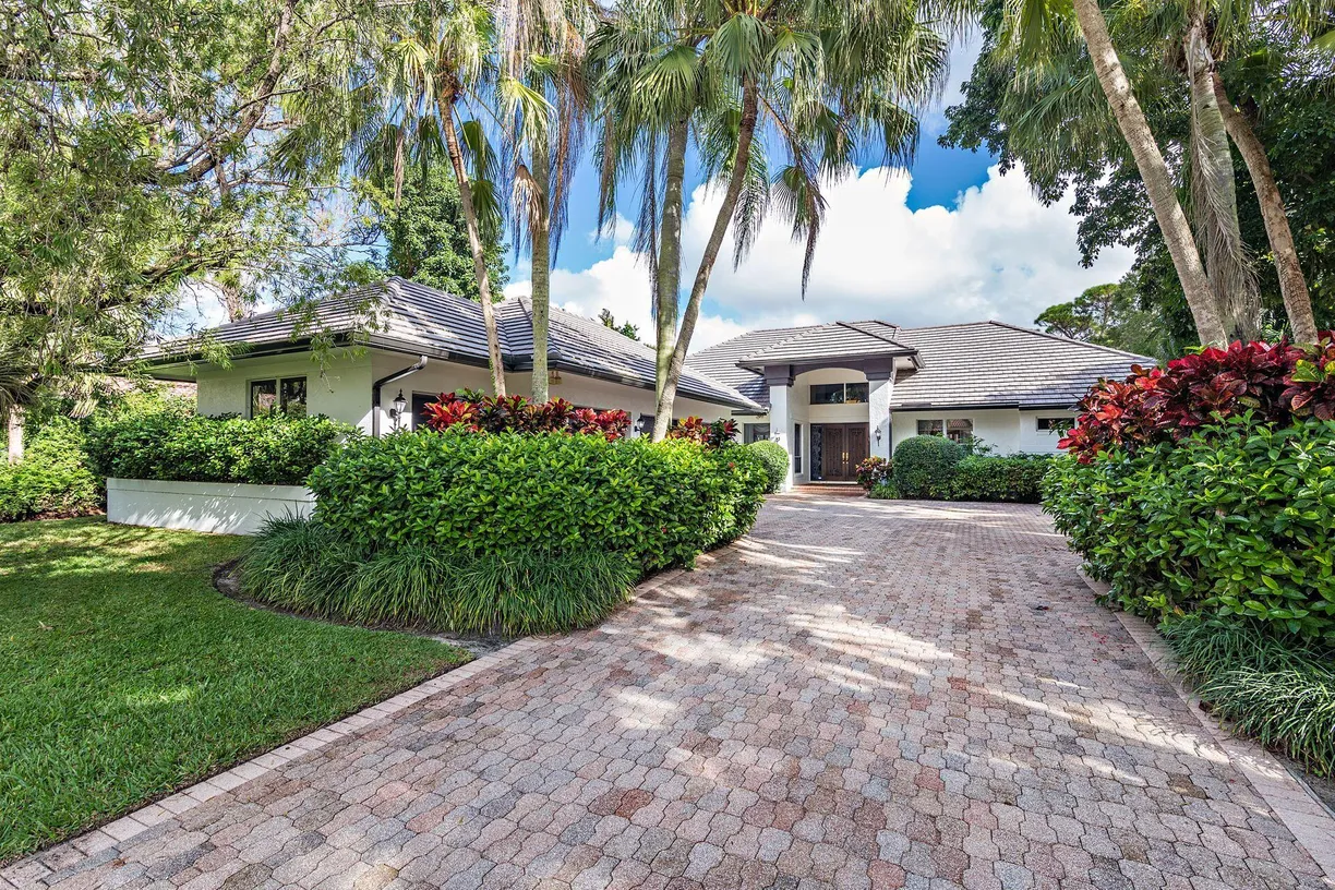 South Florida Real Estate | View 1496 Breakers West Boulevard | 4 Beds, 5 Baths