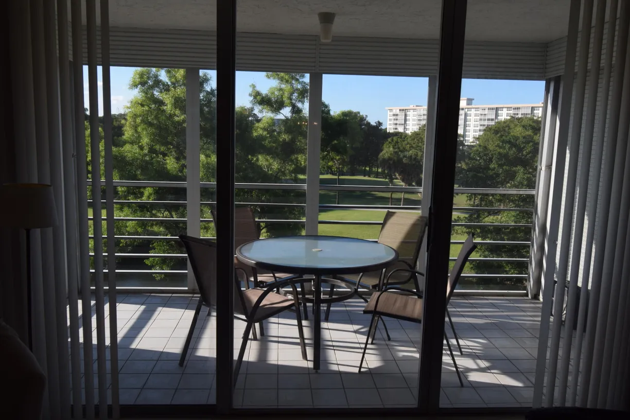 South Florida Real Estate | View 4015 W Palm Aire Drive, 506 | 3 Beds, 2 Baths