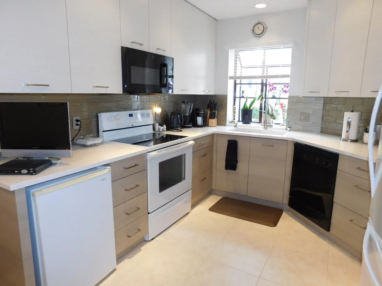 South Florida Real Estate | View 5203 Europa Drive, H | 2 Beds, 2 Baths