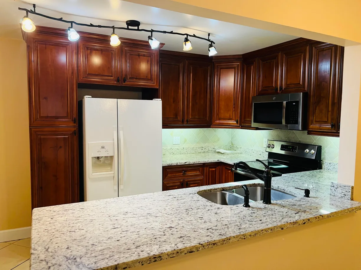 South Florida Real Estate | View 717 Sunny Pine Way, A1 | 2 Beds, 2 Baths