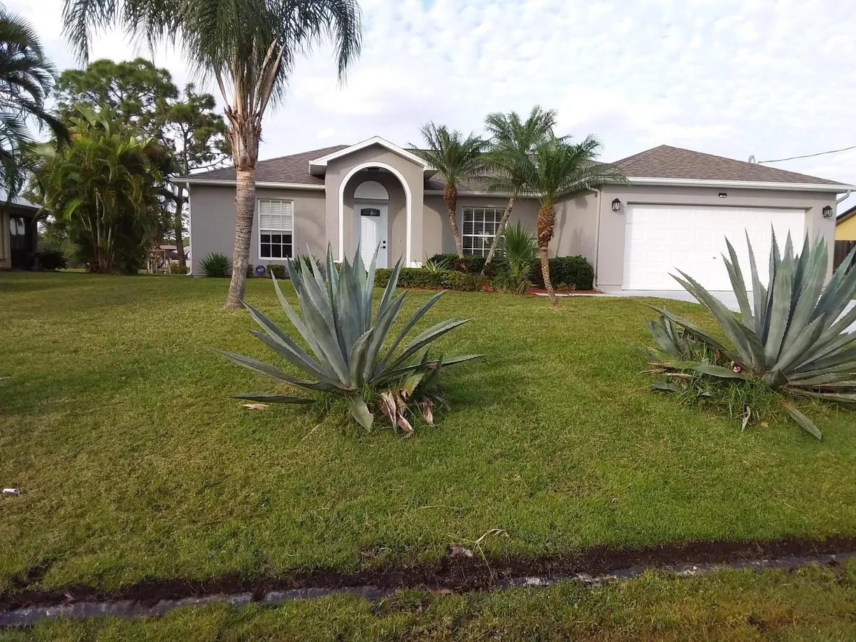 South Florida Real Estate | View 6125 NW East Deville Circle | 3 Beds, 2 Baths
