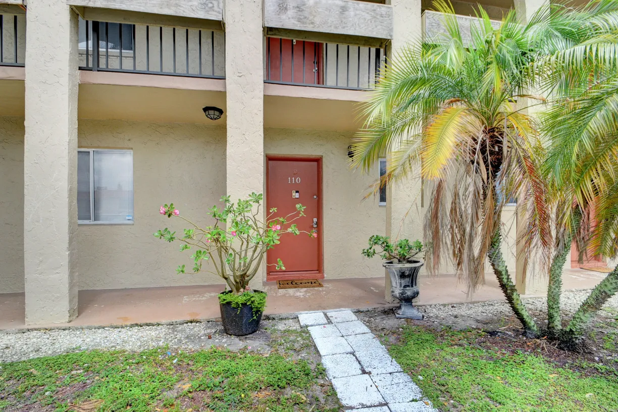 South Florida Real Estate | View 6086 Forest Hill Boulevard, 110 | 2 Beds, 1 Bath