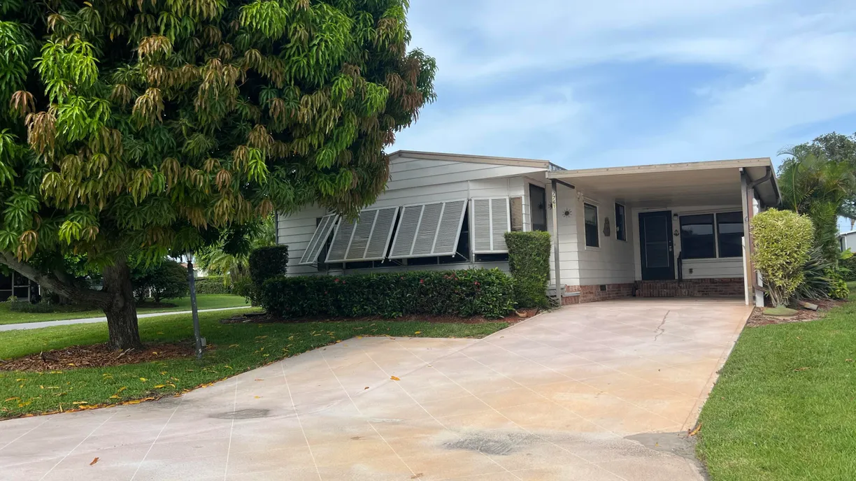South Florida Real Estate | View 7761 SE Shenandoah Drive | 2 Beds, 2 Baths