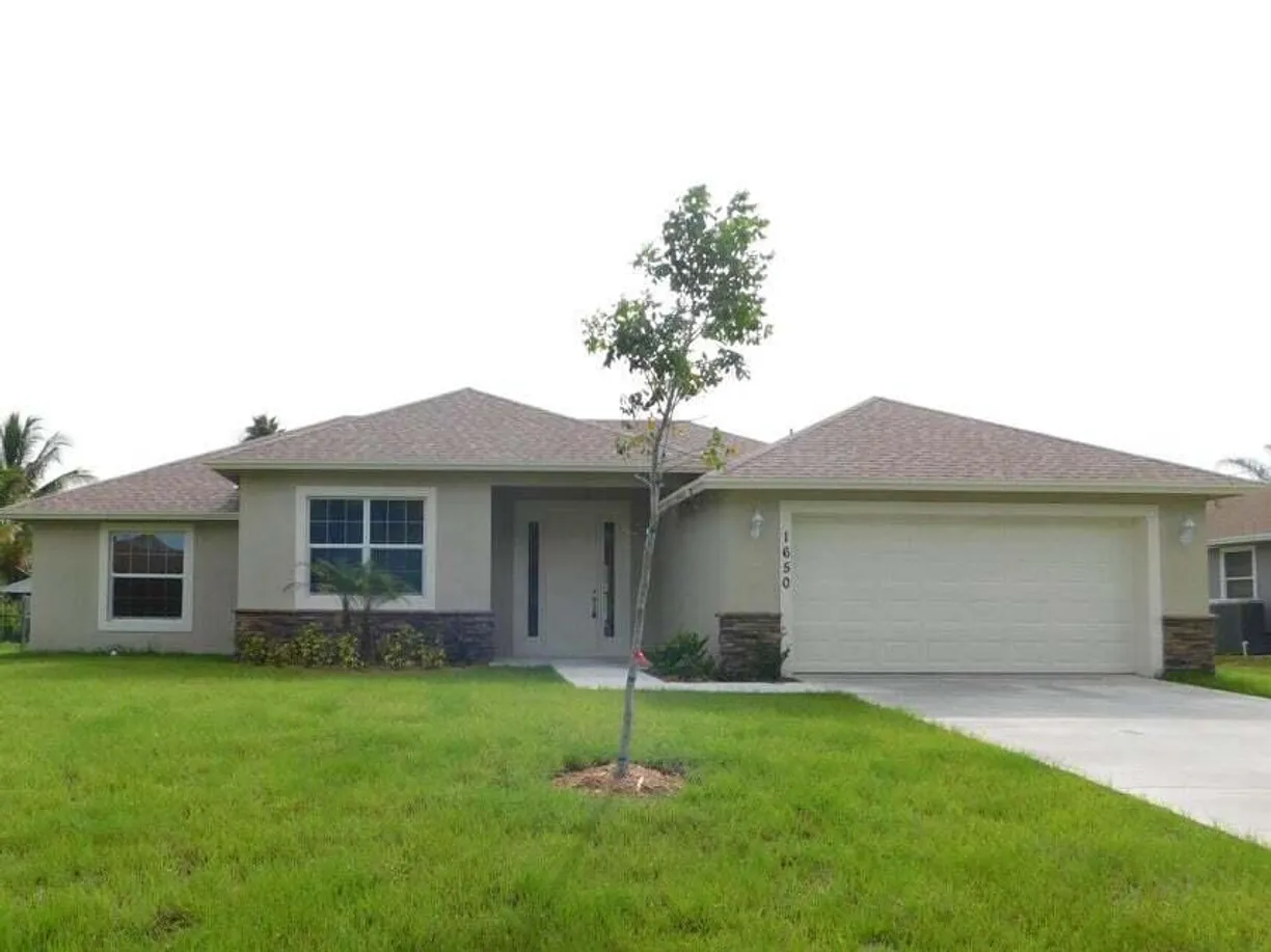 South Florida Real Estate | View 1650 SW Sylvester Lane | 4 Beds, 2 Baths