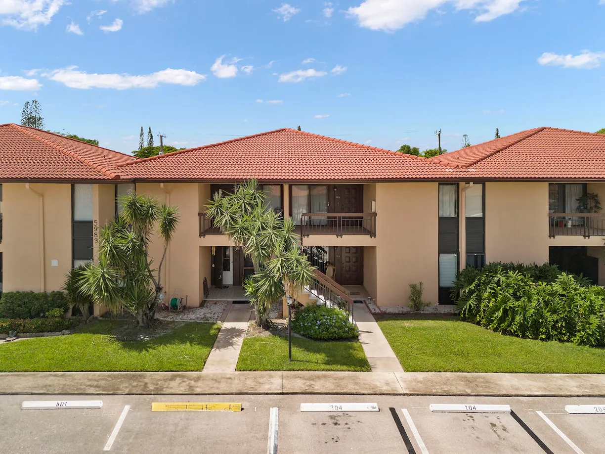 South Florida Real Estate | View 5983 Forest Hill Boulevard, 103 | 2 Beds, 2 Baths